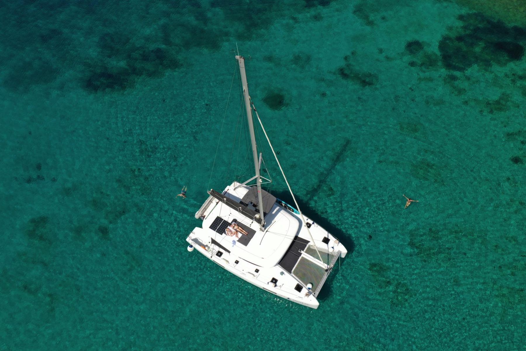 seascape-experiences-mykonos-greece-cyclades-fleet-rental-charter-lagoon-catamaran-delos-rhenia -delos daily cruise