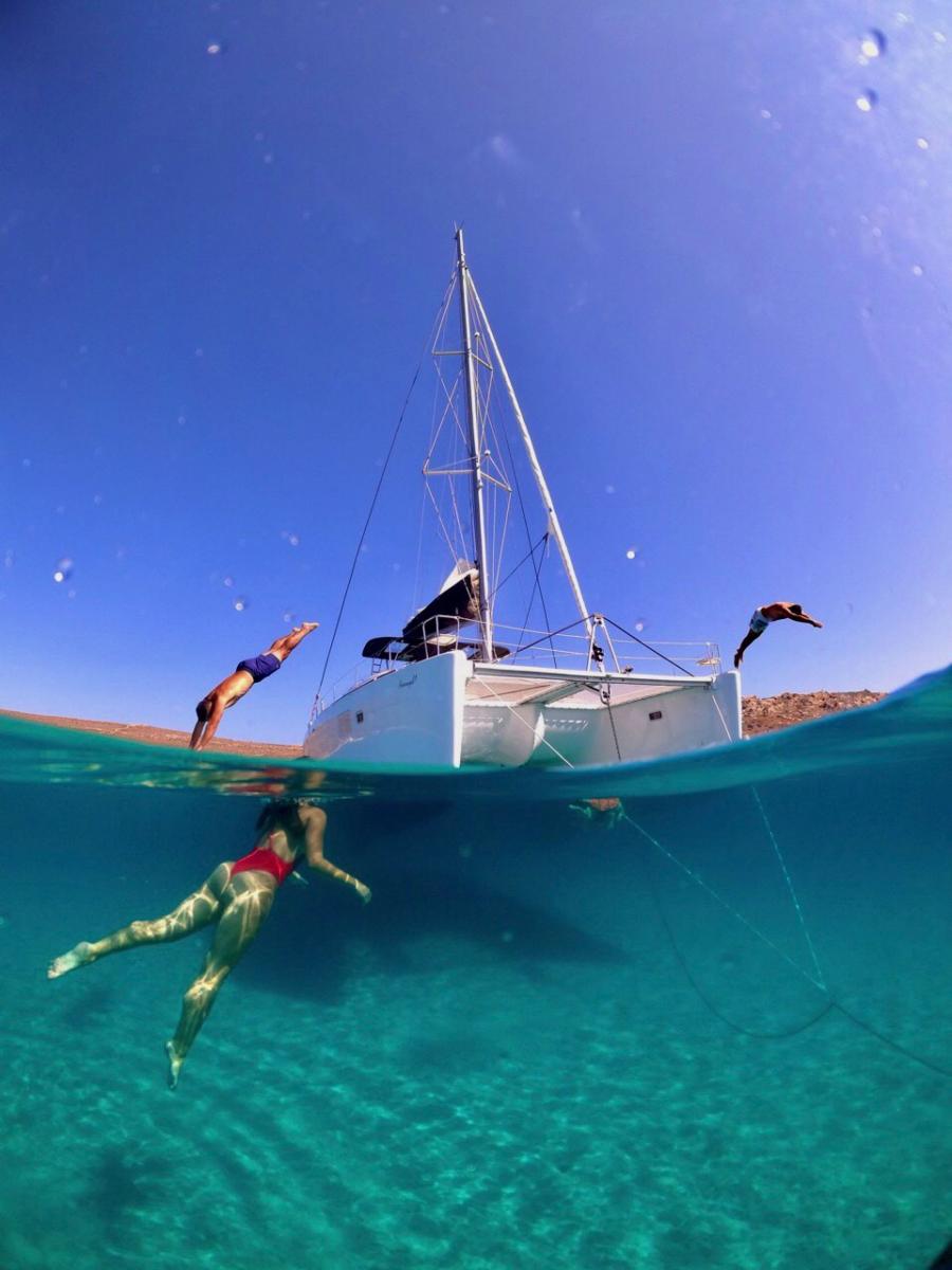 seascape-experiences-mykonos-greece-cyclades-fleet-rental-charter-lagoon-catamaran-crystal clear water, bachelorette, party , special events