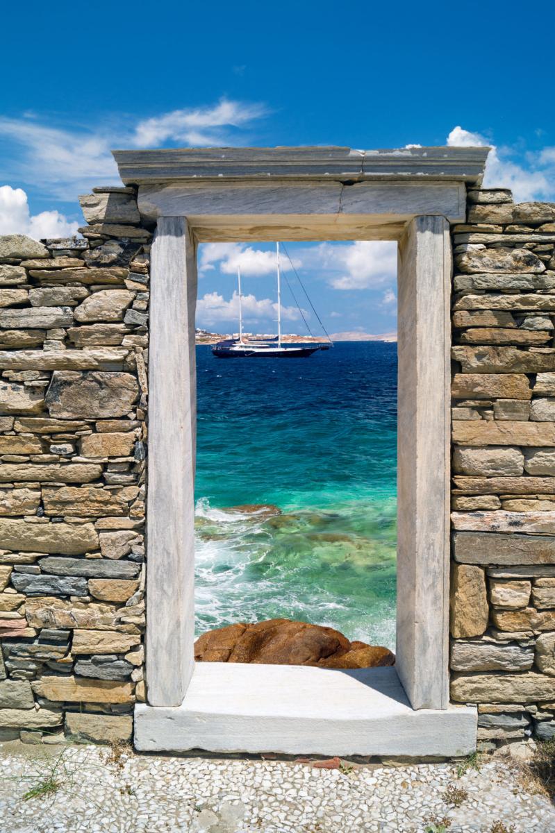 Ancient ruins of Delos Island, Greece, with historic stone structures.