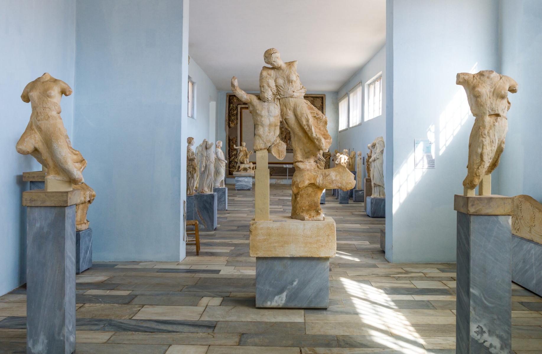 Artifacts and sculptures inside the Delos Archaeological Museum.