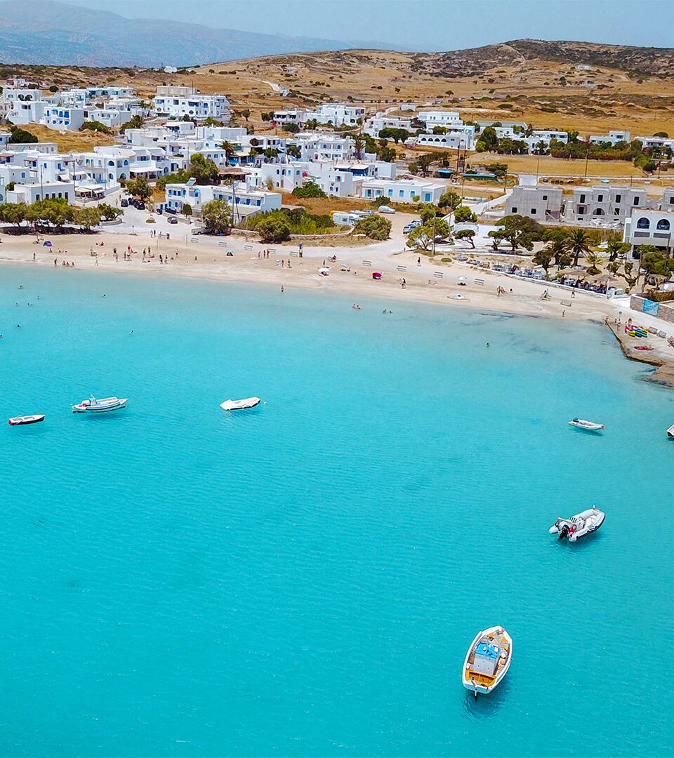 Scenic view of Koufonisi Port with fishing boats and turquoise waters