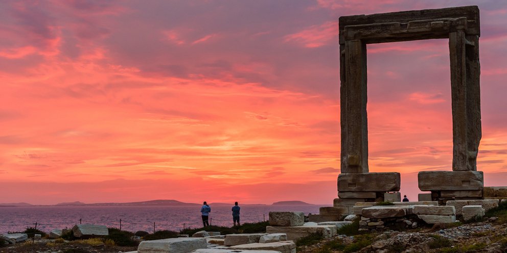 The ancient Temple of Apollo on Naxos, with the famous Portara gate framing the sunset