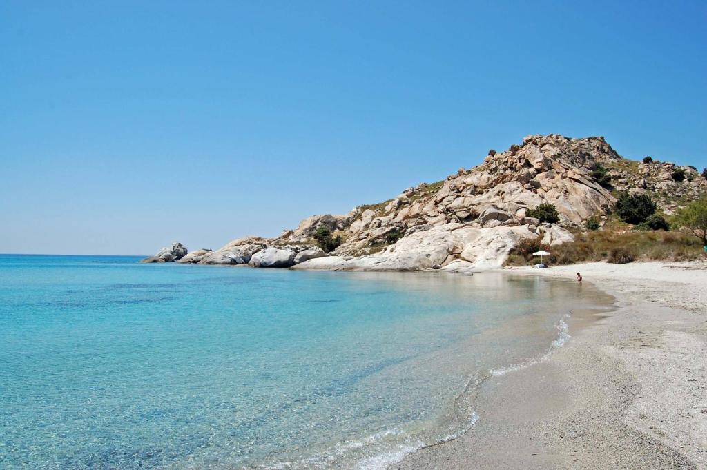 Idyllic beach on Naxos Island with golden sand and turquoise waters