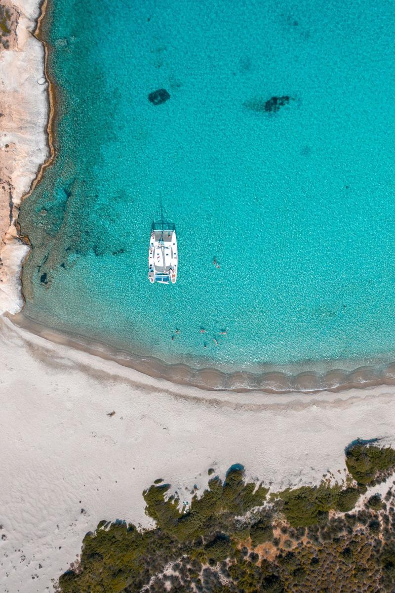 Charming beach on Polyaigos, with soft sand, clear waters, and no crowds, providing the perfect escape.
