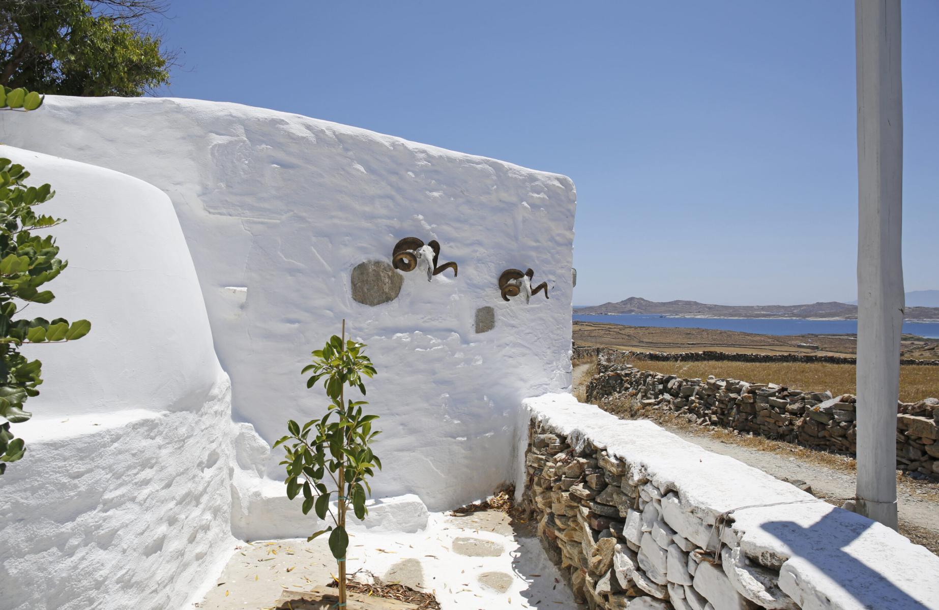 Exploring Rhenia Island’s Unspoiled Nature & Beaches