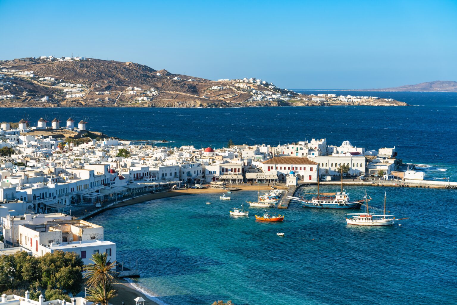 Picturesque Mykonos Town, known for its winding alleys, boutique shops, and lively atmosphere.