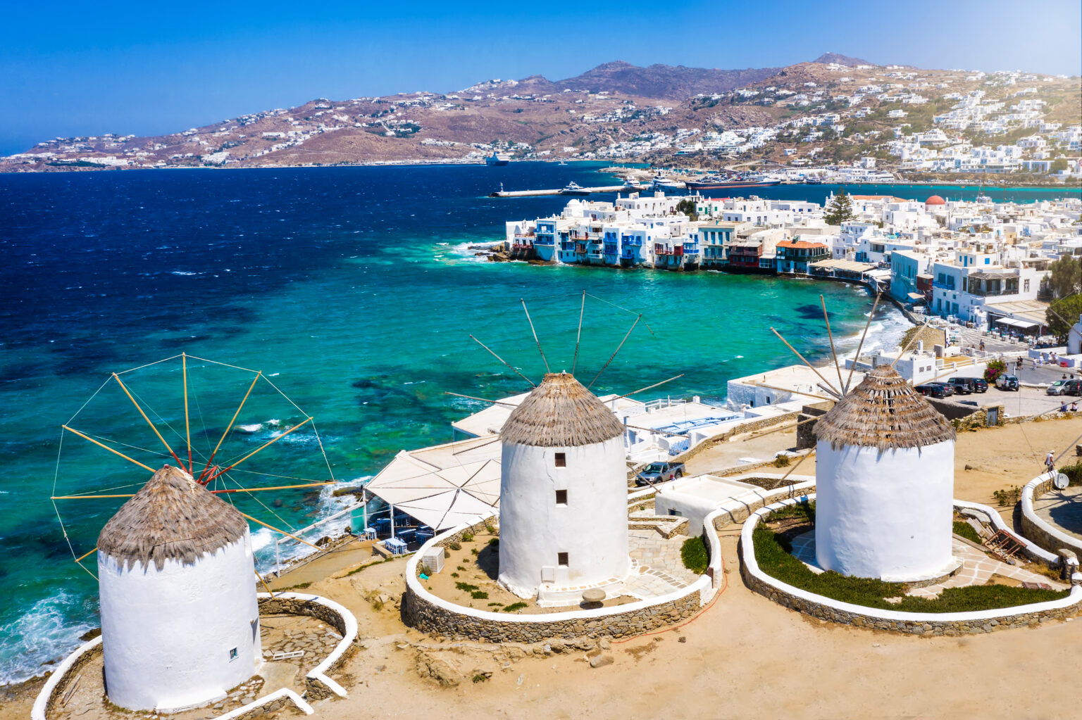 The famous windmills of Mykonos overlooking the Aegean Sea.