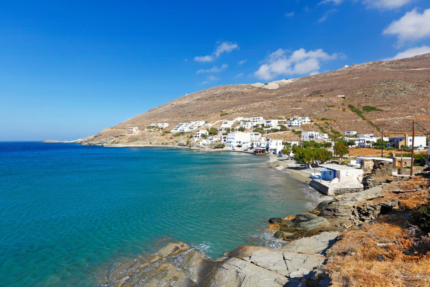 Secluded cove on Tinos Island, surrounded by natural beauty and the Aegean Sea