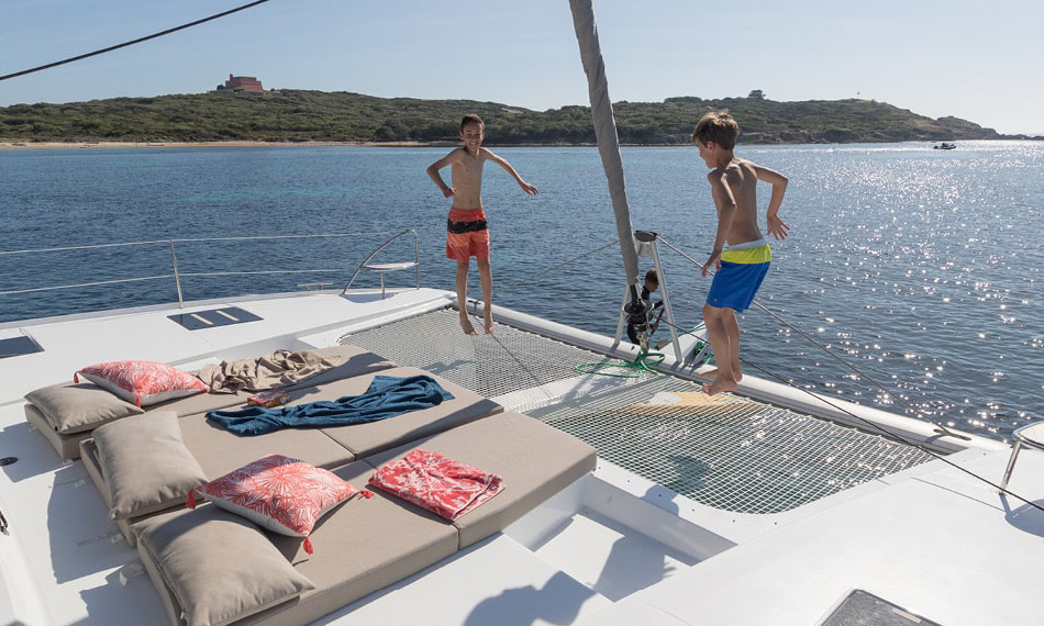 Guests Enjoying a Scenic Catamaran Cruise in Mykonos