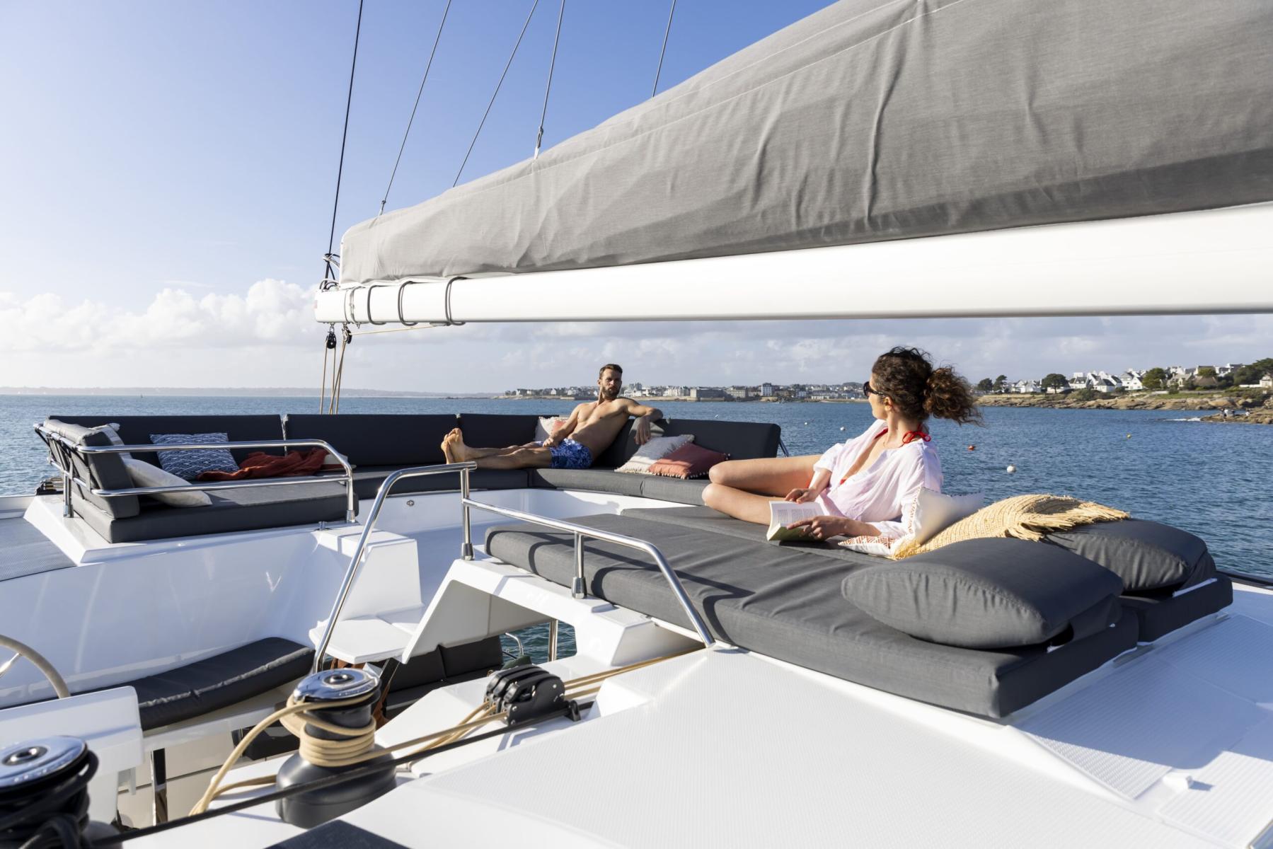 Relaxing on the Spacious Deck of a Mykonos Catamaran