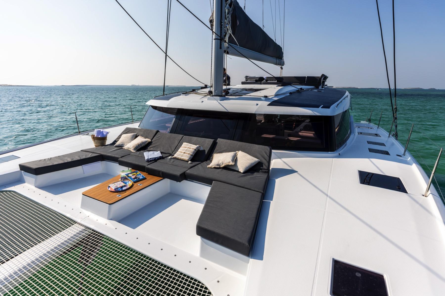 Enjoying the Sea Breeze on a Luxury Catamaran’s Outdoor Deck