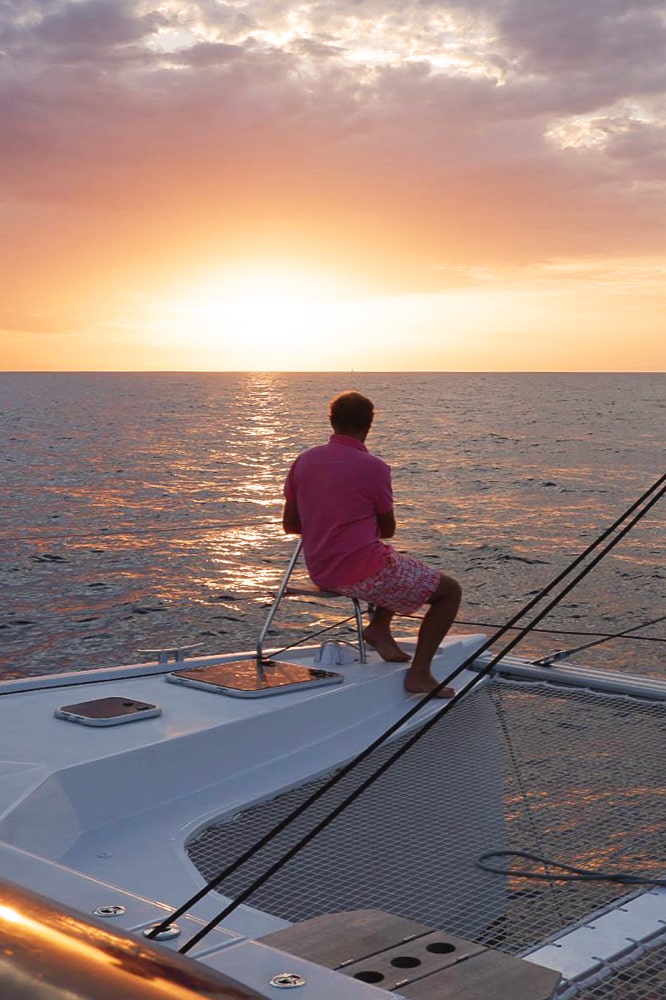 Sunset sailing in Mykonos – Breathtaking views from a private catamaran cruise.