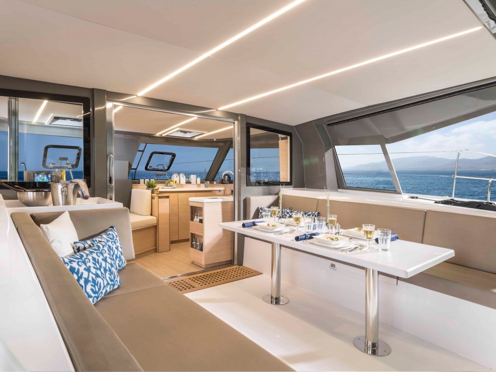 Modern catamaran lounge – Comfortable indoor space with panoramic sea views.