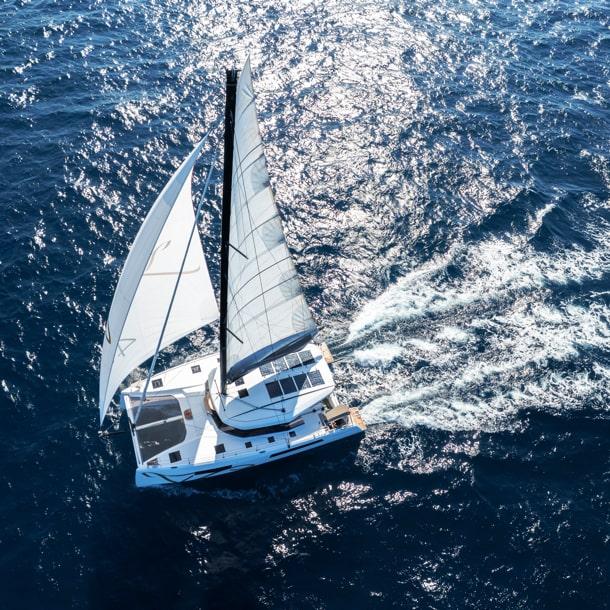 Spacious catamaran deck with stunning views of the Aegean Sea.