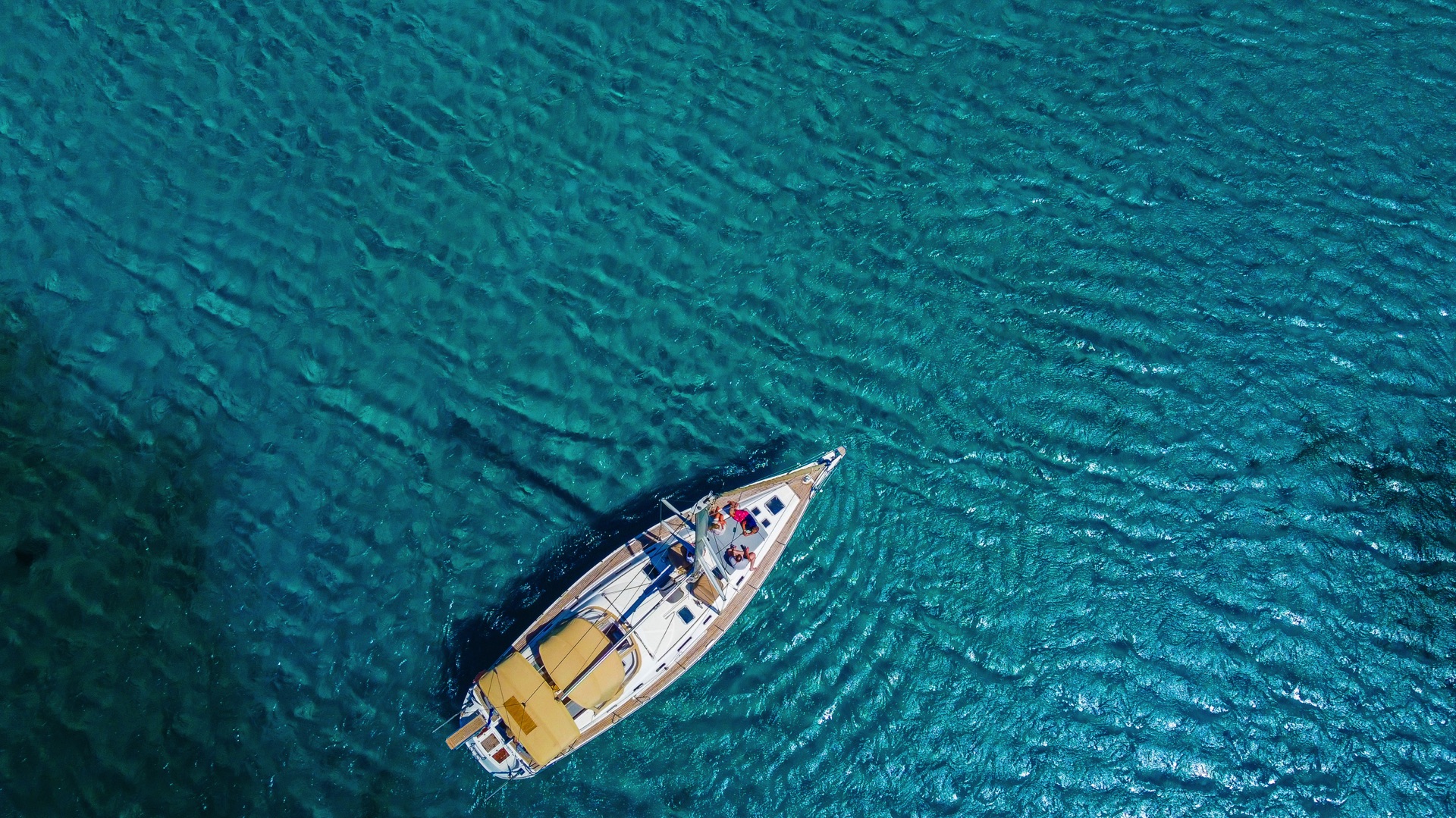 Luxury Sailing Yacht Ocean Star in Mykonos – "The Ocean Star sailing yacht cruising through the turquoise waters of Mykonos, offering a premium yachting experience.