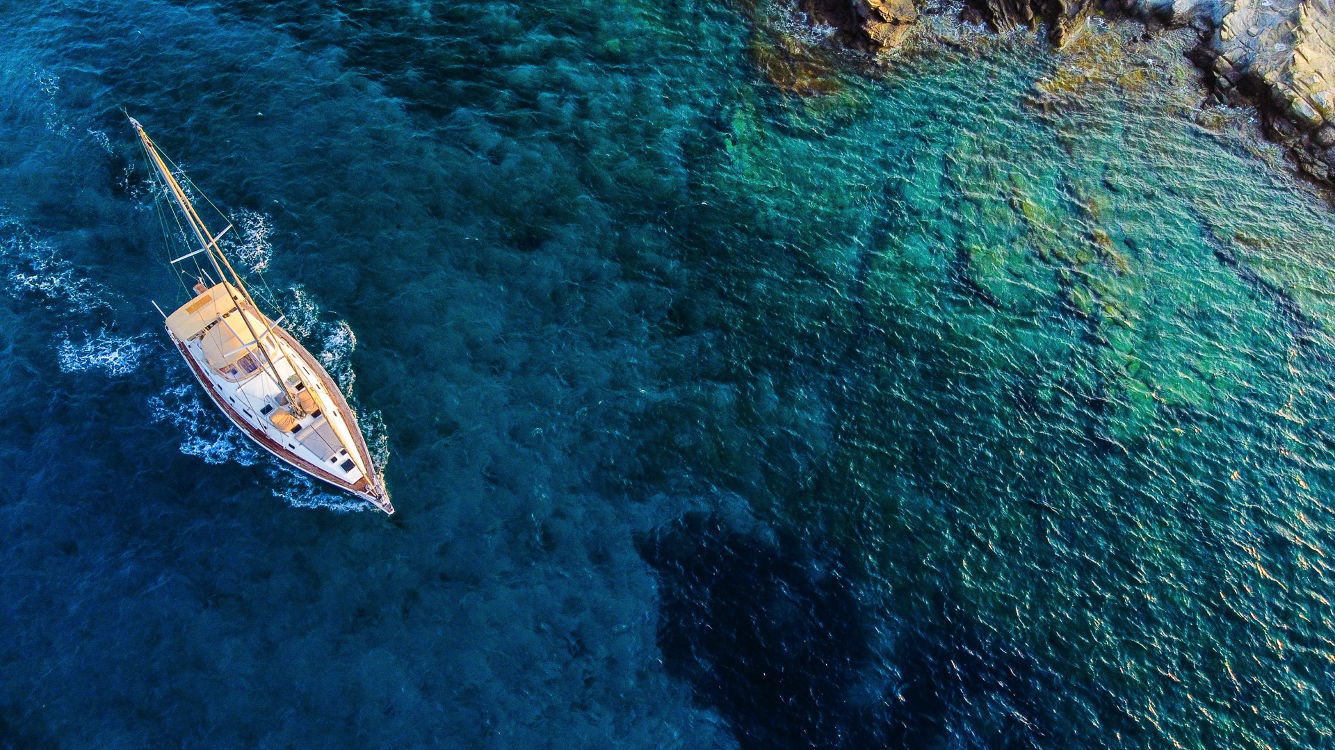 dventure Sailing with Ocean Star in Mykonos – "A thrilling sailing experience as the Ocean Star yacht catches the wind, gliding through the Aegean waves
