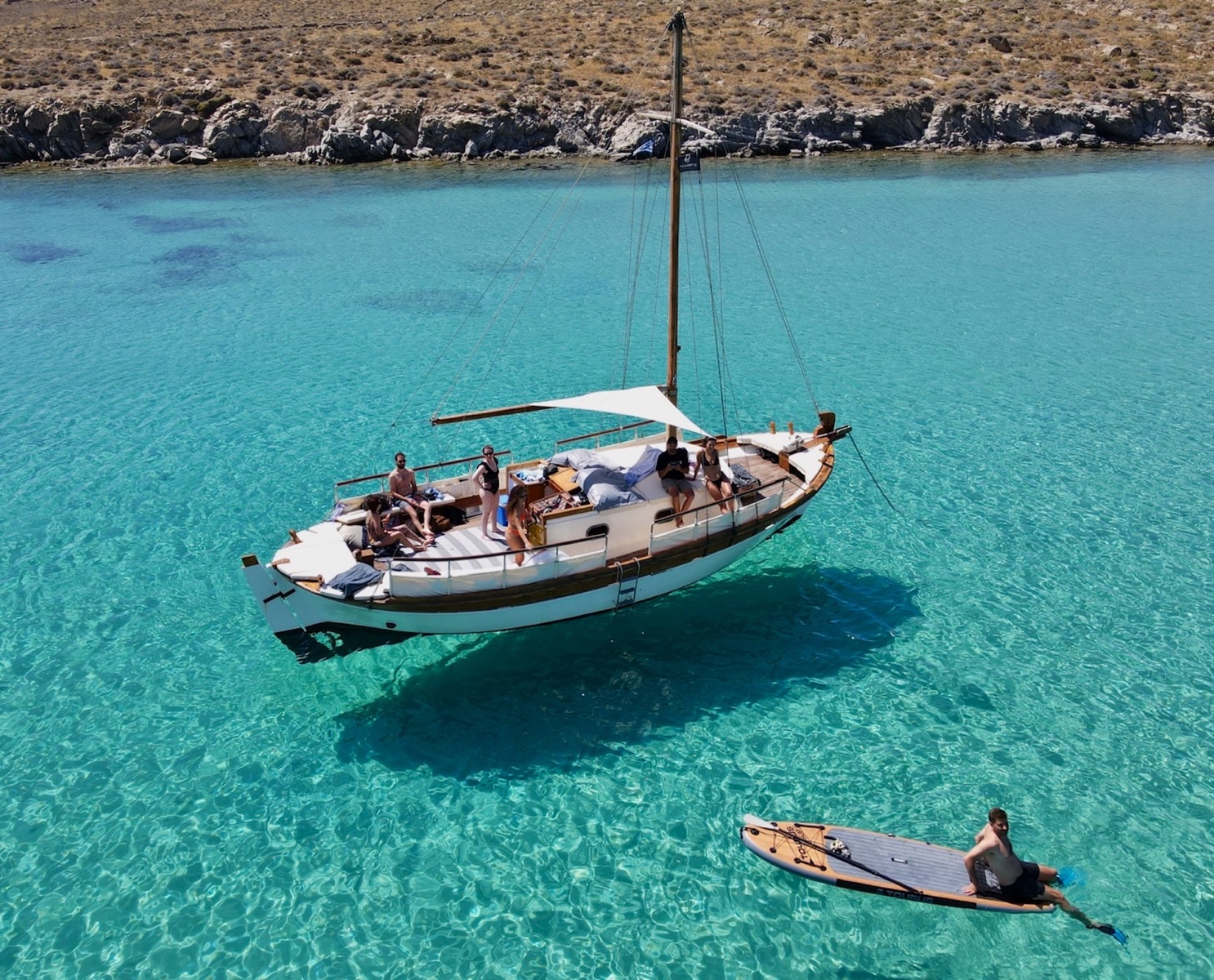Authentic Mykonos experience – Explore the coastline on a traditional wooden caique
