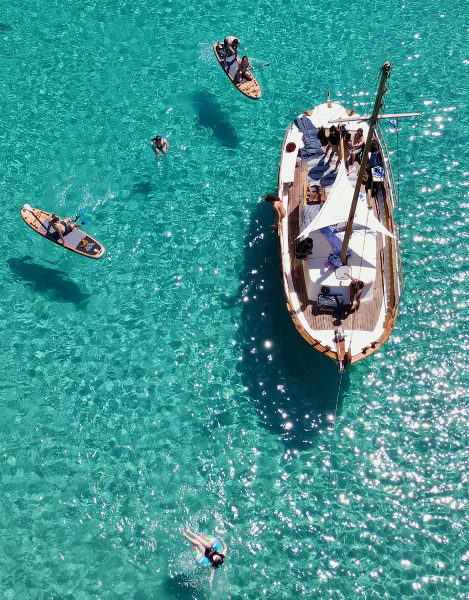 Authentic Mykonos experience – Explore the coastline on a traditional wooden caique