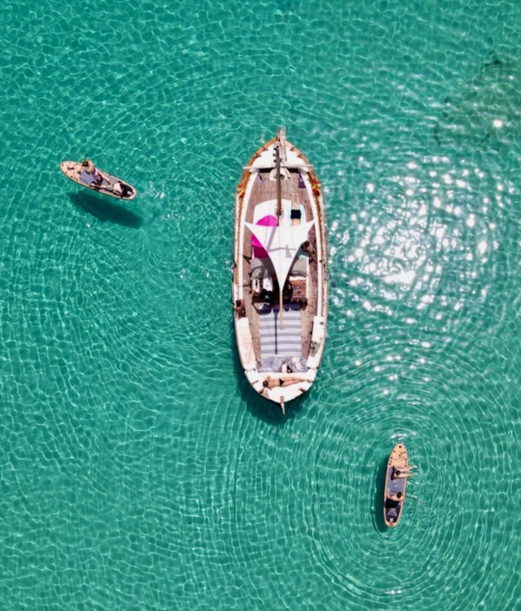 Authentic Mykonos experience – Explore the coastline on a traditional wooden caique
