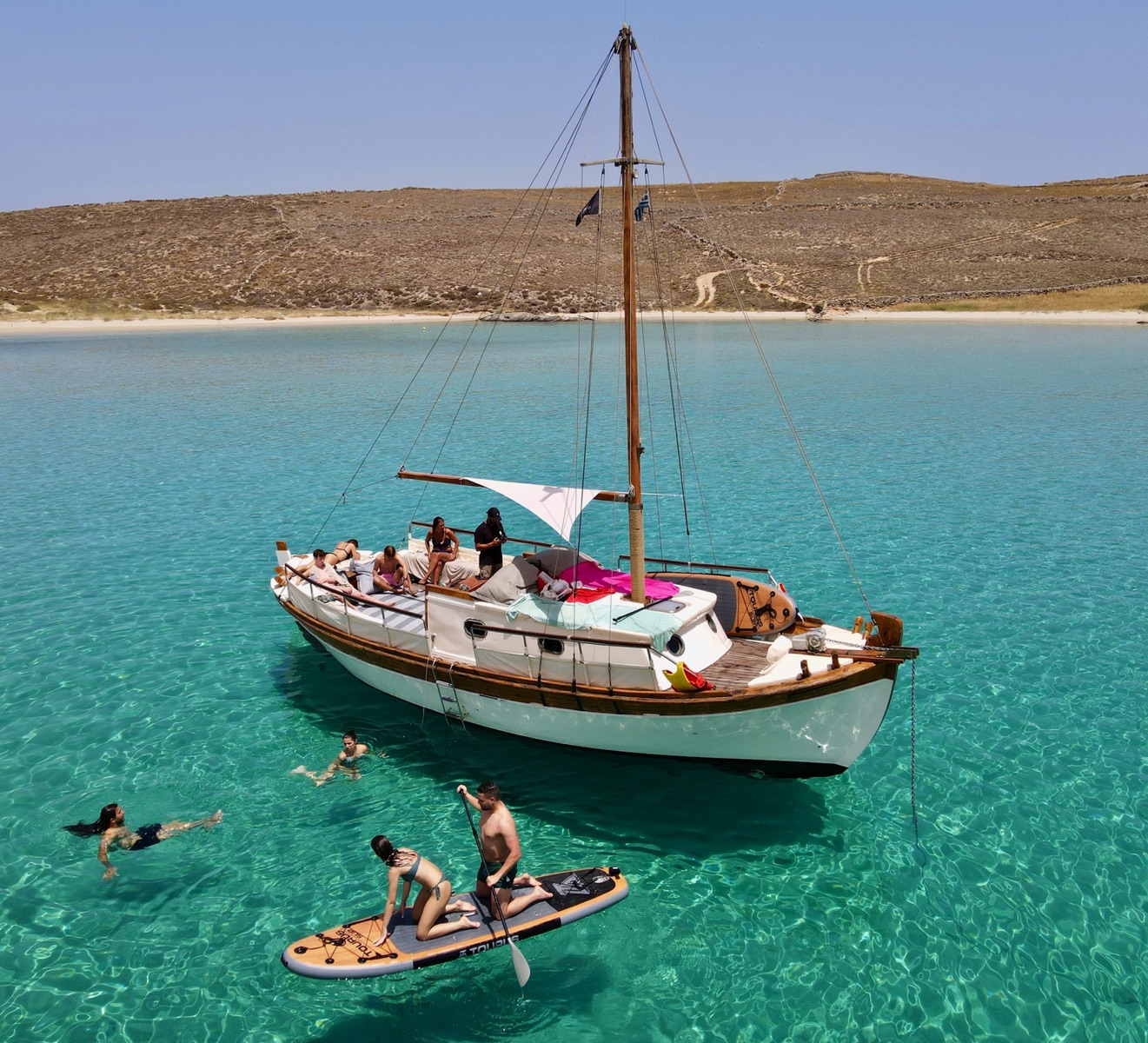 Authentic Mykonos experience – Explore the coastline on a traditional wooden caique