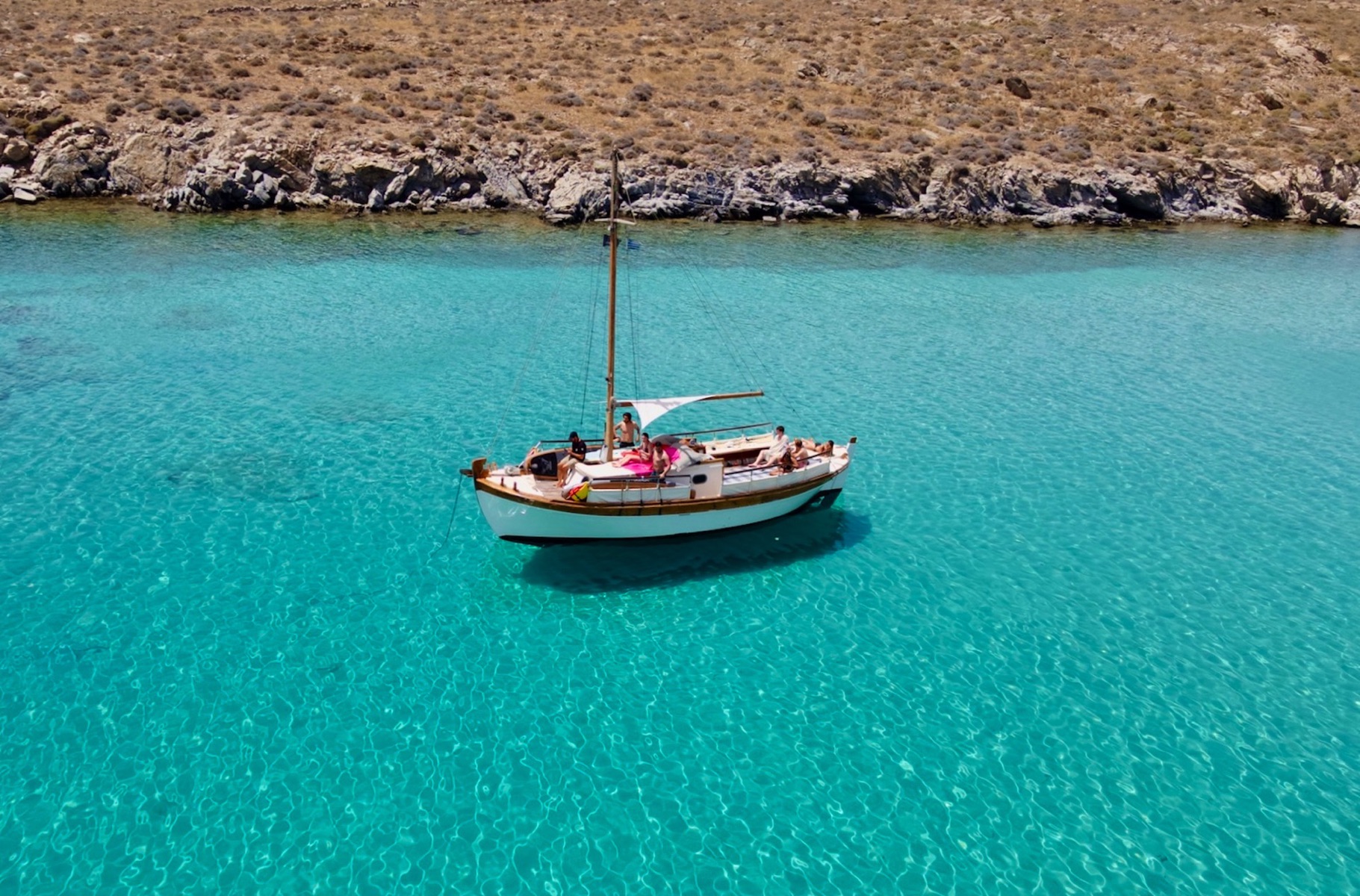 Authentic Mykonos experience – Explore the coastline on a traditional wooden caique