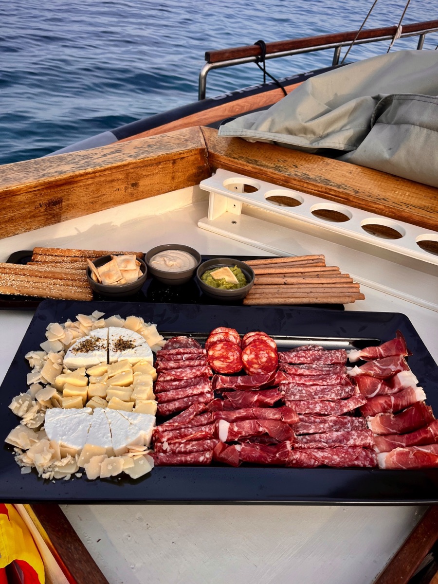 Authentic Mykonos experience – Explore the coastline on a traditional wooden caique