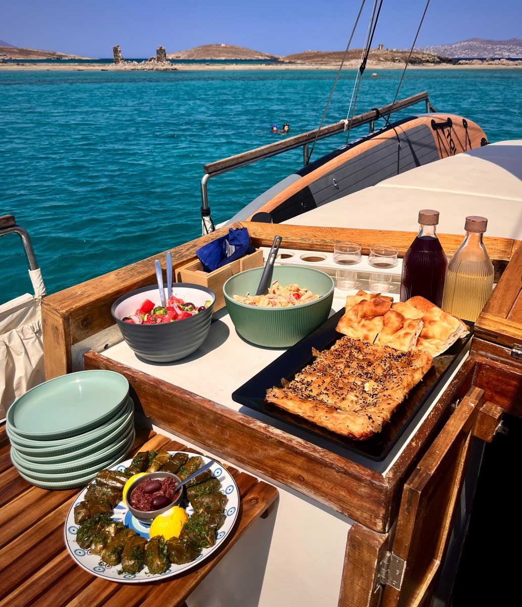 Authentic Mykonos experience – Explore the coastline on a traditional wooden caique