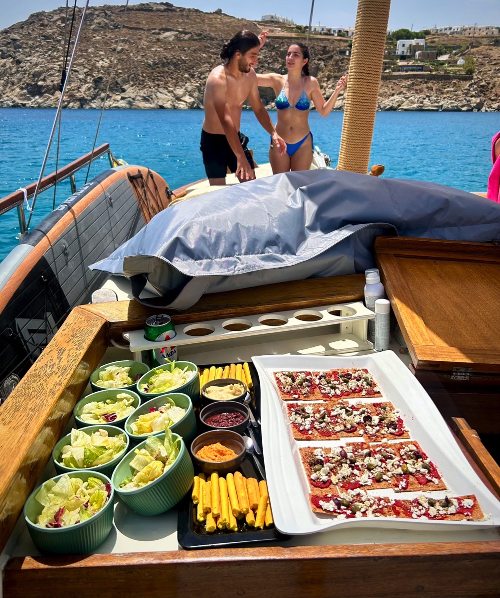 Authentic Mykonos experience – Explore the coastline on a traditional wooden caique