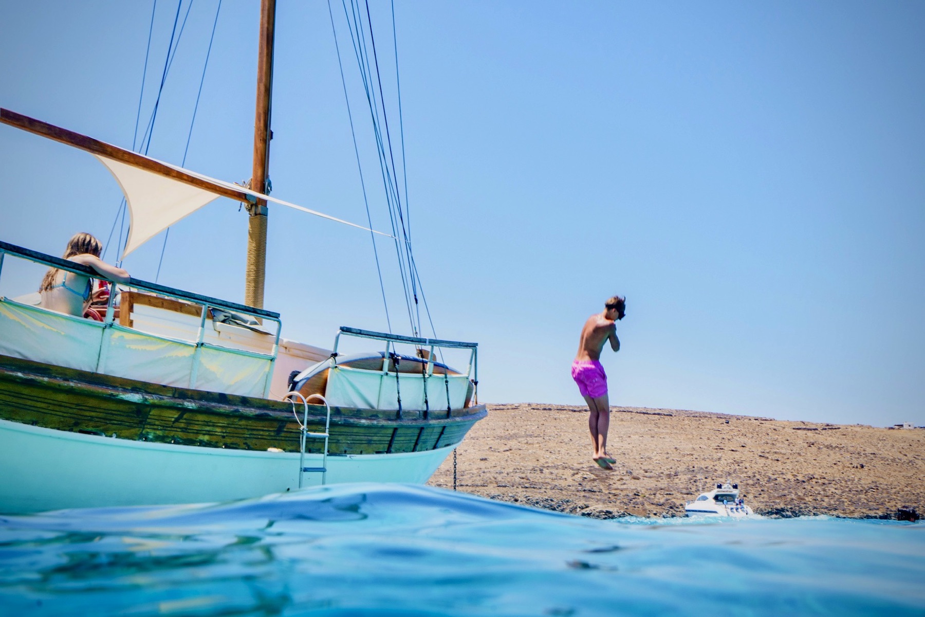 Authentic Mykonos experience – Explore the coastline on a traditional wooden caique