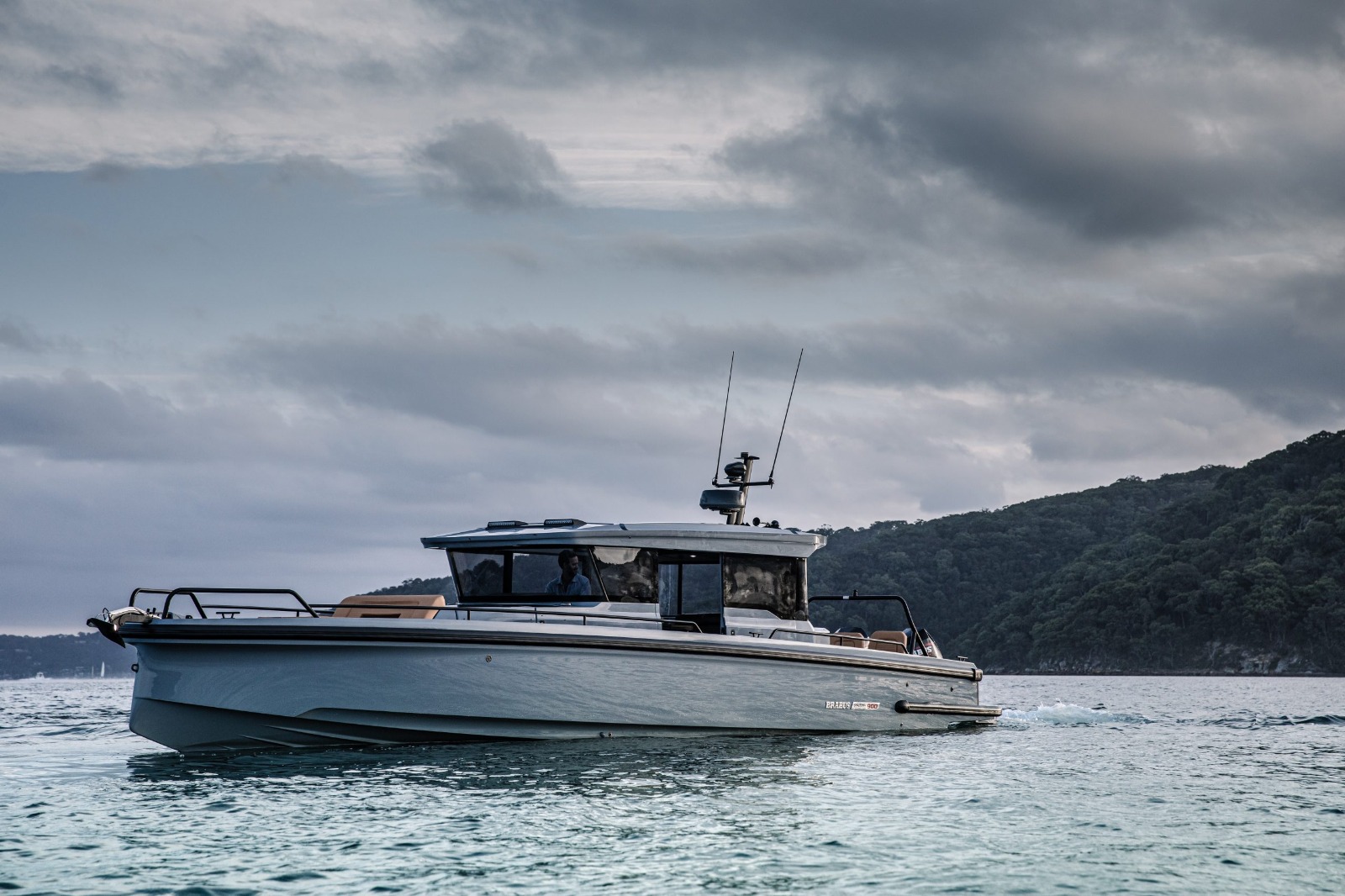 ast and stylish Axopar Brabus boat for island-hopping around Mykonos.